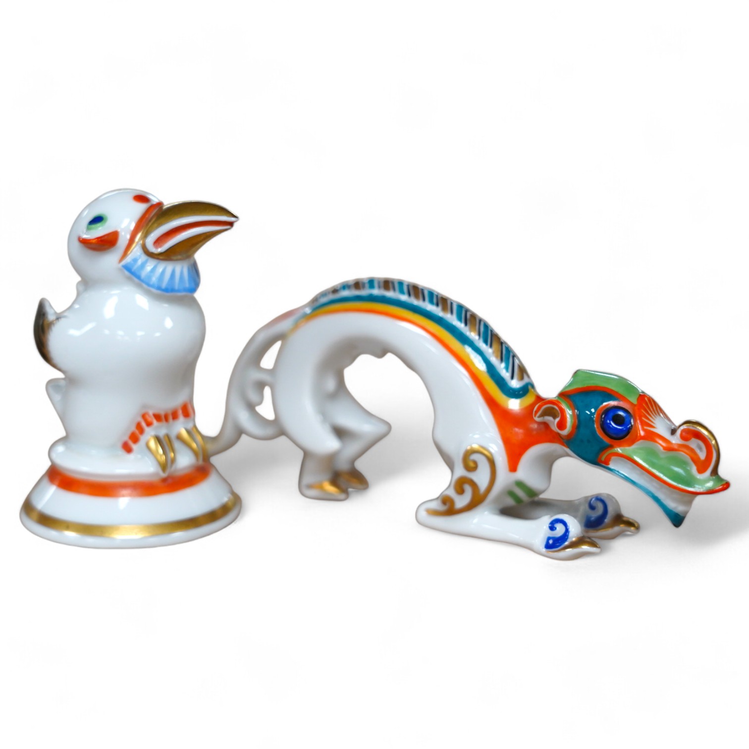 Two Art Deco Rosenthal Selb Bavaria small figures, modelled by Hans Küster, c.1925, comprising 'Schwenk', a Chinese river dragon 11.5cm long, and a stylised bird, 6cm high, Condition - good